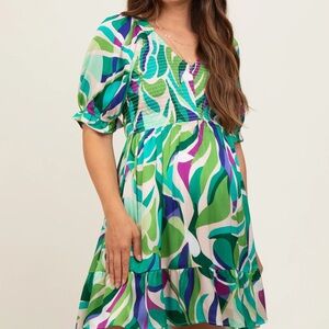 Emerald green abstract print smocked dress